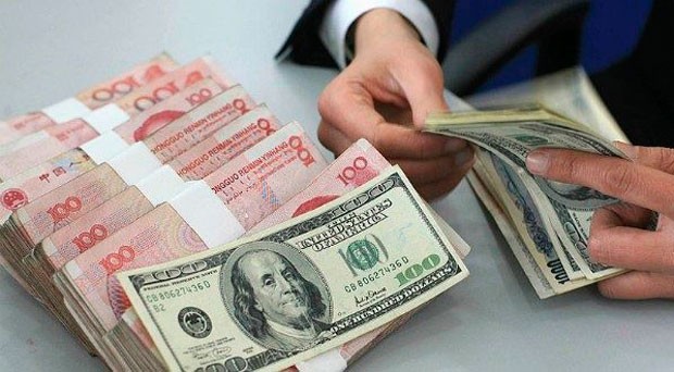gurcustanda-dollarin-bahalasmasi-suretlenib